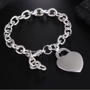 Sterling 925 bracelete with heart tag